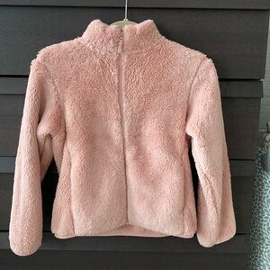 Uniqlo child’s pink fluffy zip up. Ages 9-10 in excellent condition